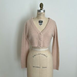 Cropped long sleeve sweater in soft blush pink